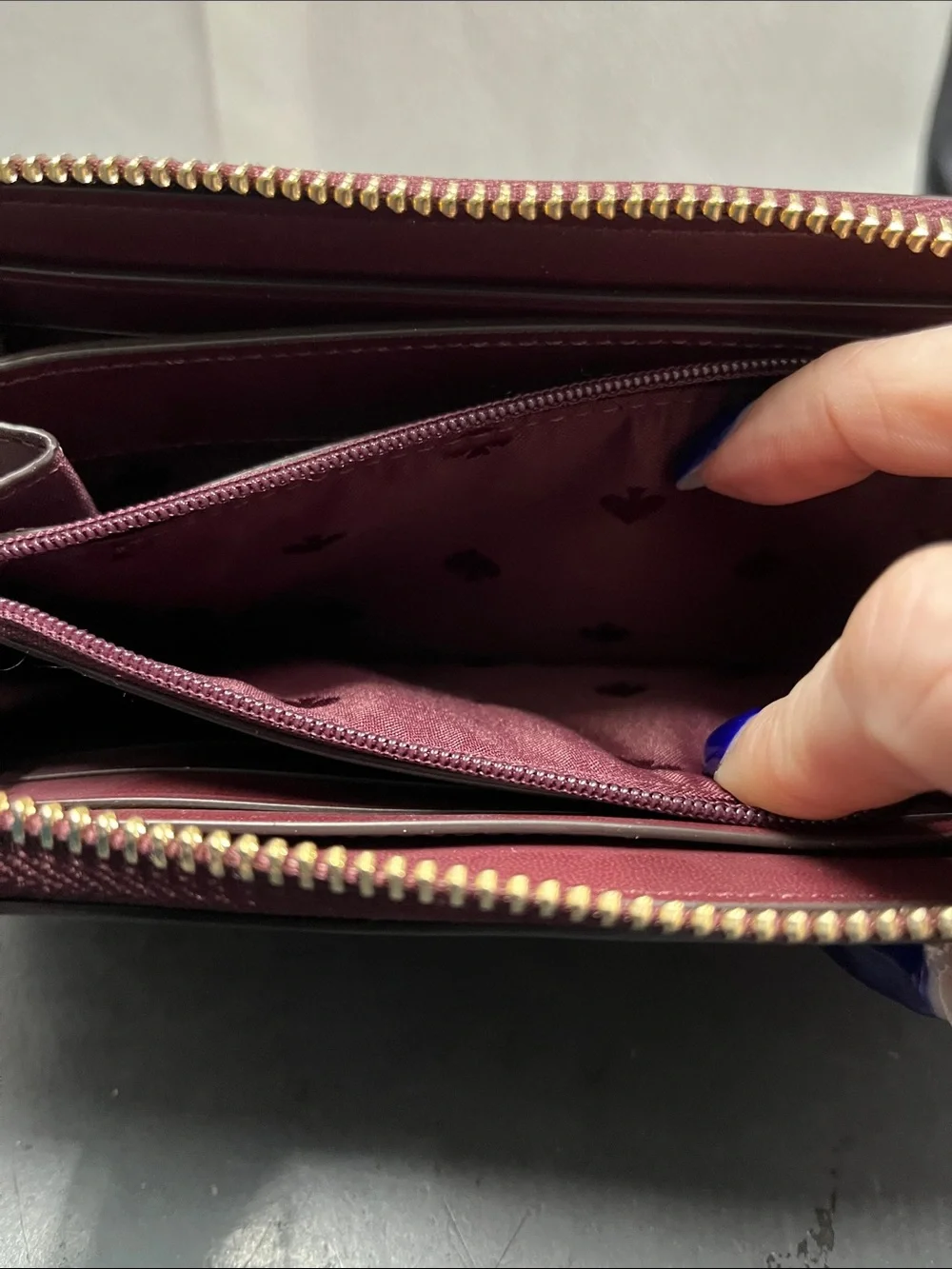NWOT Kate Spade pink floral on dark maroon zip-around wallet
